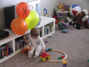 2nd-birthday-030 She's was just as excited to play with the balloons the next morning and is enjoying the train that we got her.