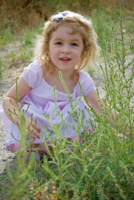 Amelie loved exploring the fields where we took the pictures. 