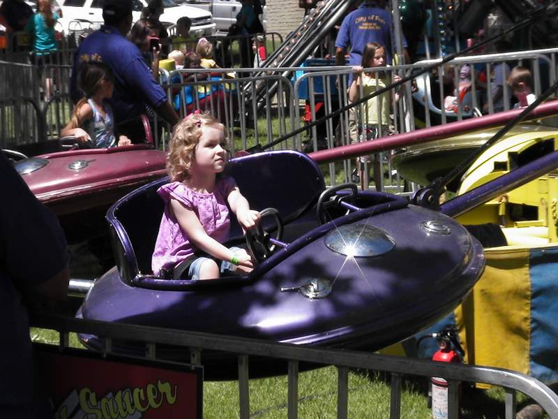 Amelie loved loved loved the carnival. She's definitely a ride junkie.