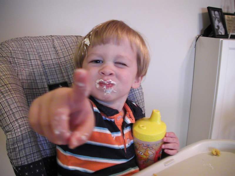 Pointing as if I'm the one with yogurt all over me!