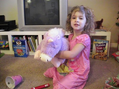 Amelie's such a lucky girl--she got exactly what she asked for from Santa! A unicorn Pillow Pet. Calder got a dog one and they both love their new toys that double as pillows when you unfold them. These things are all the rage these days. It seems like all the kids at preschool have one.