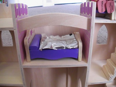 I thought Amelie's use of a miniature candy bar wrapper was pretty clever. If you look at the previous picture, you'll see that I whipped up a little blanket for her later in the day.