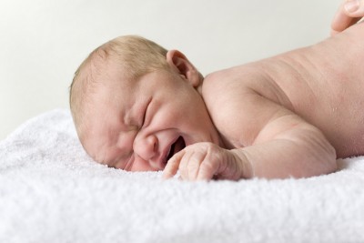 This is why there aren't more pictures of cute naked baby on a pile of towels.