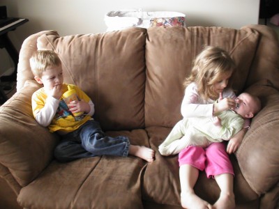 This picture pretty much says it all. Amelie just adores Easton and still can't get enough of him. Calder? He could take him or leave him, probably. He's a good big brother, though. Always very sweet with Easton.