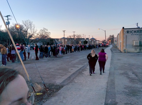 We got there early to wait in line outside the venue. By the time doors opened, the line wrapped all the way around the block behind us.