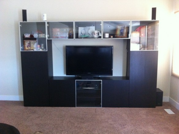 Our entertainment center. I'm enjoying all the storage for books and toys. We have plans to put a big wall clock on the wall to the left of the entertainment center.