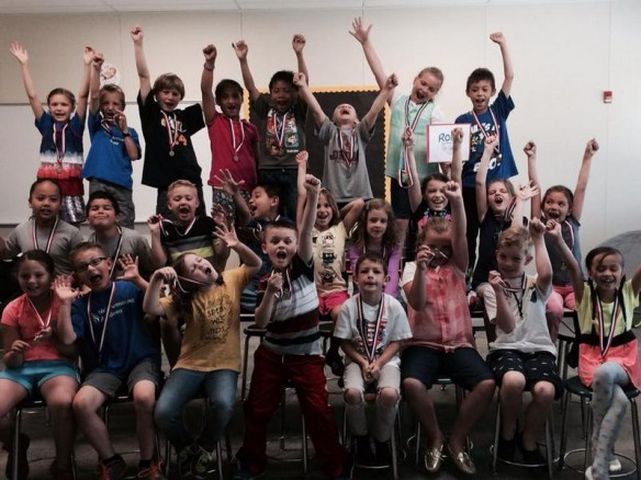 "Hey, guys! Show us how excited you are that you all met your reading goals for the year!" And then there's my sweet subdued little Amelie.