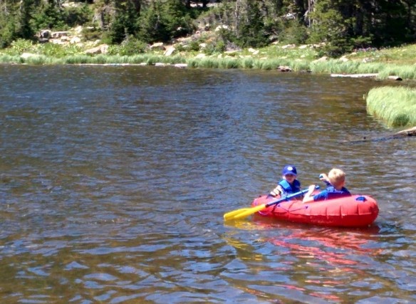 Keian taking Calder for a raft ride.