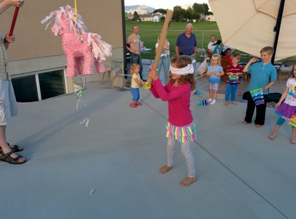 Bless their hearts, they all tried, several times, but it ended up taking some grown-up help to get the candy to spill out.