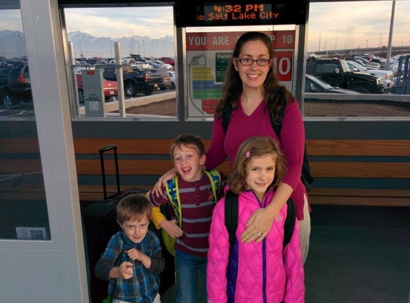 At the airport waiting for the shuttle to take us to our terminal. Can you tell Calder's excited?