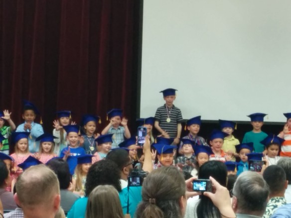 Calder graduated from kindergarten! One of those moments when the fact that your child is standing one stair above the rest makes for a great photo-op.